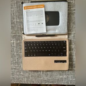 Wireless keyboard for 9.5” IPad/other tablets. Brand new in original package.